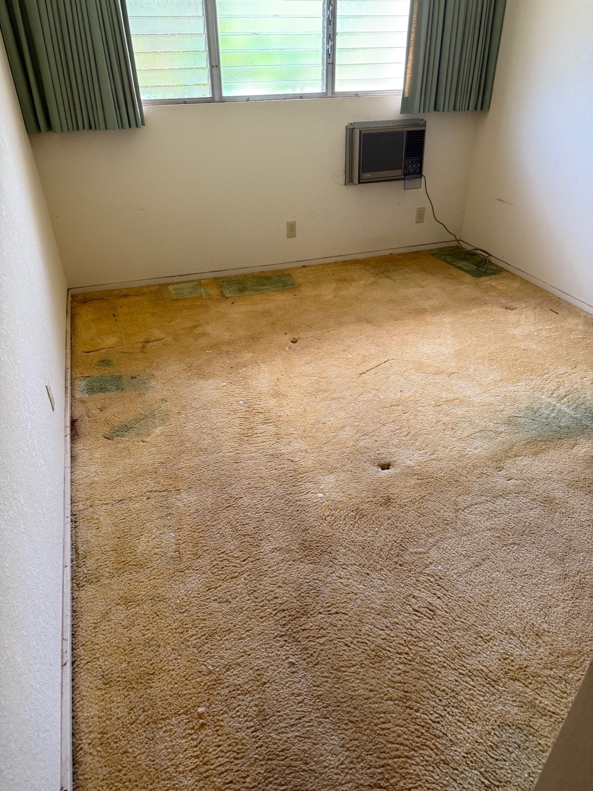 Old carpet stained floor