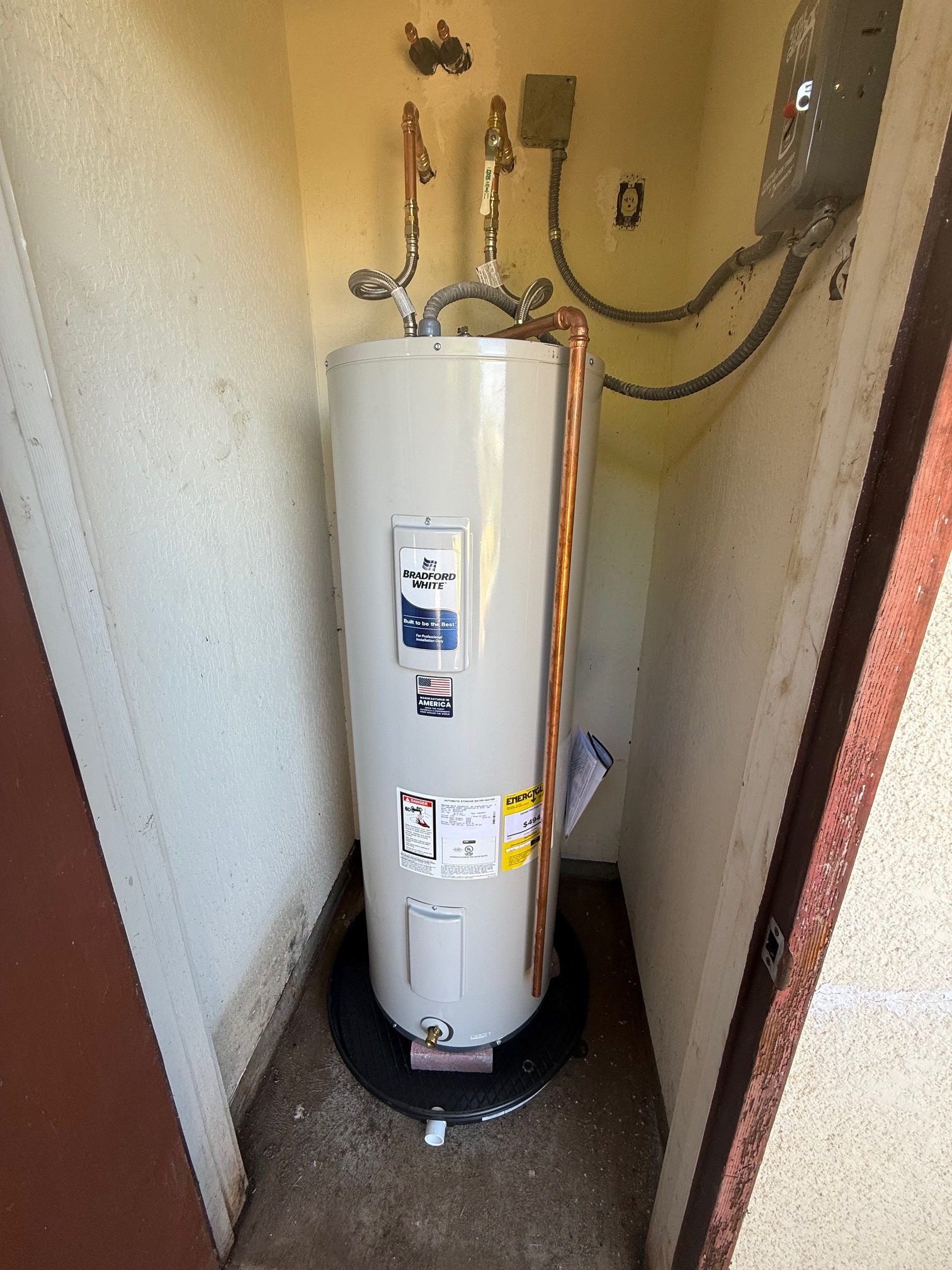 New 50-gallon electric water heater with new plumbing and switch