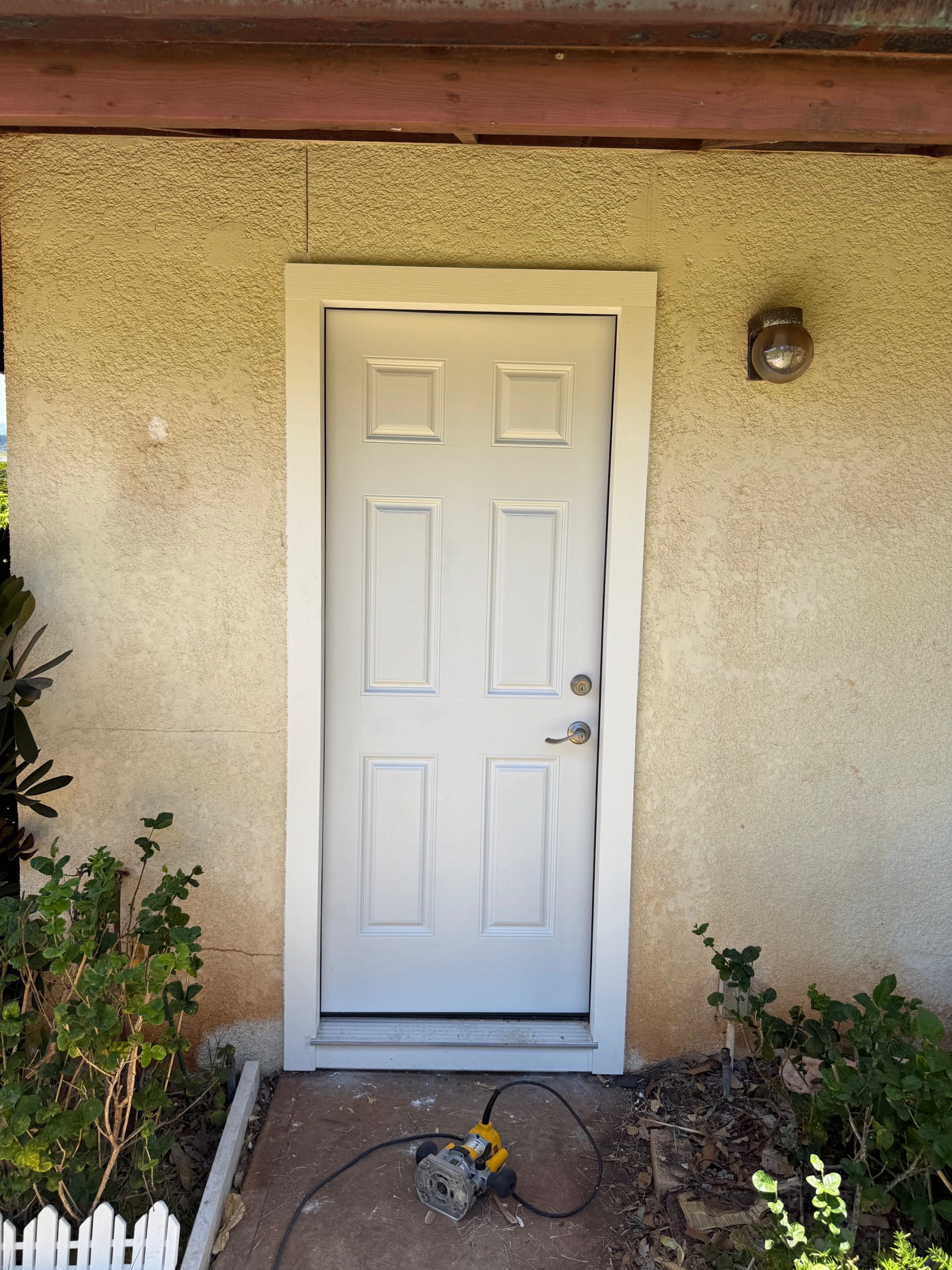 replaced exterior door with new door and trim