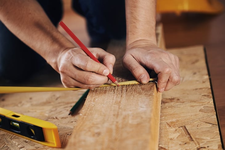Hands working with wood